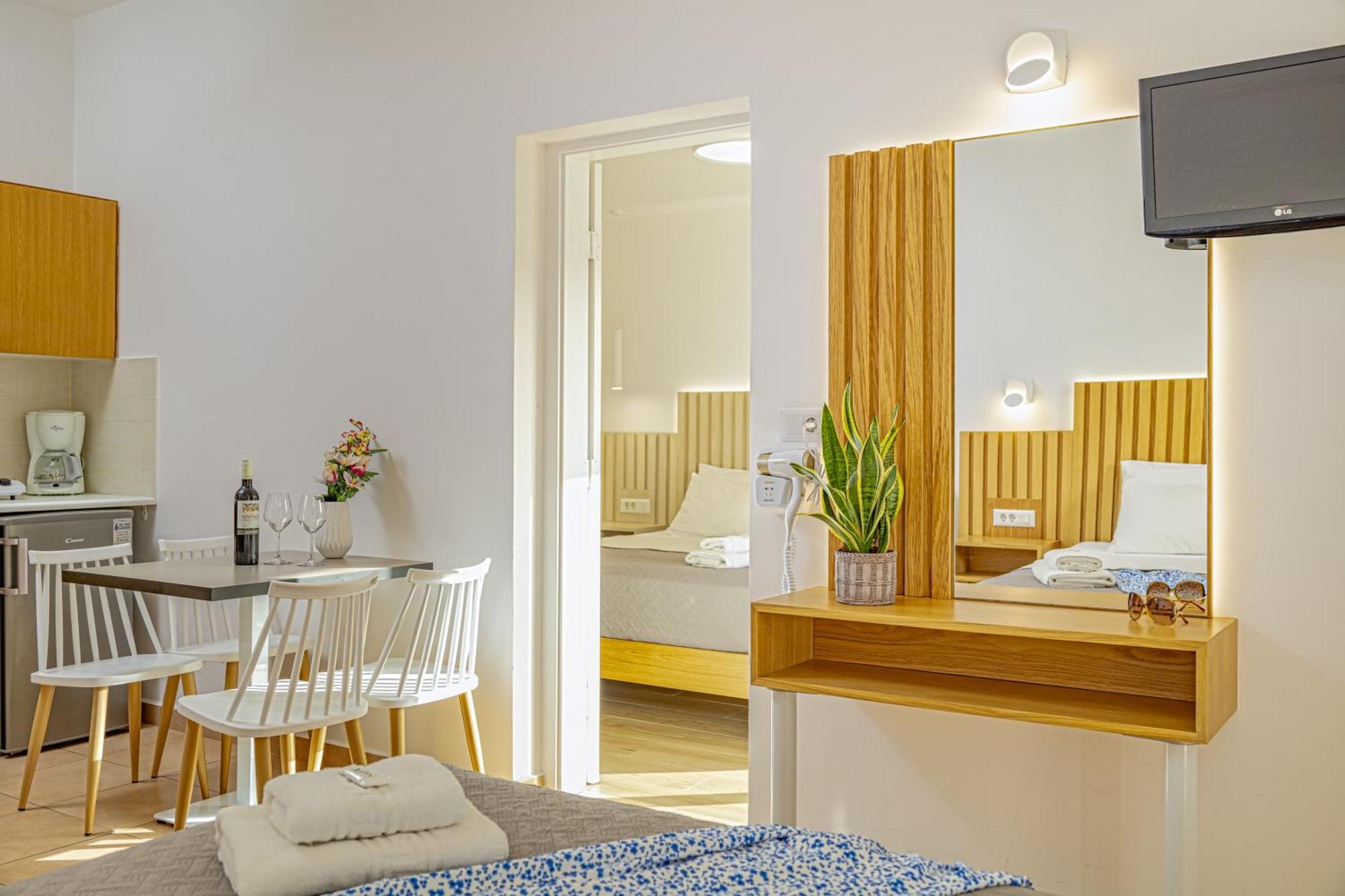 Theos Village Aparthotel